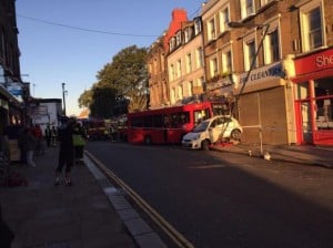 Woman rescued after bus ploughs into parked car and restaurant in Westow Hill, Crystal Palace