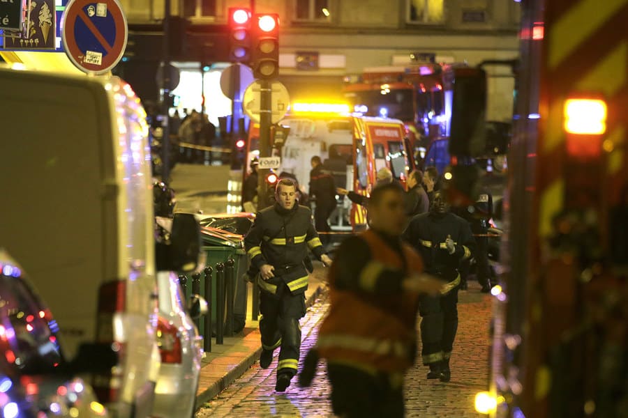 Rescuers responding to a call following the shootings in the 10th arrondissement of Paris.
