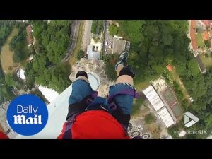 Amazing baseline jump off the top of huge Kuala Lumpur tower – Daily Mail