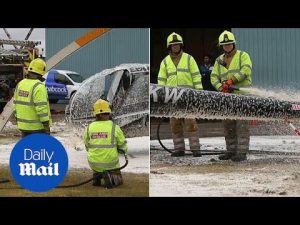 Fire services douse helicopter in foam after crash at Perth airport – Daily Mail