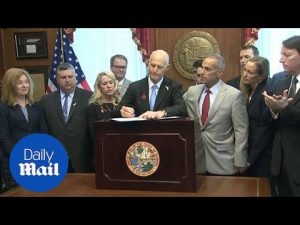 Florida Governor Rick Scott signs gun bill to ban bump stocks – Daily Mail