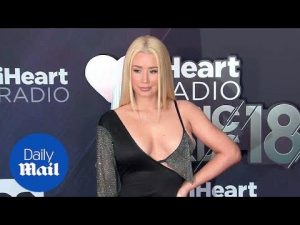 Iggy Azalea rocks chic black gown with mesh sleeves at iHeart – Daily Mail
