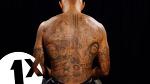 Andre Gray Breaks Down His Black History Tattoos